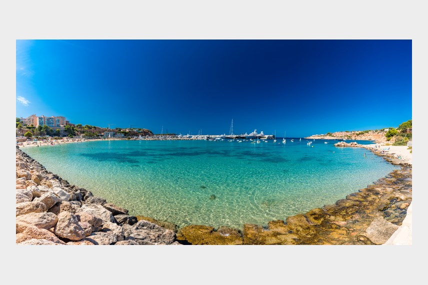 Port Adriano sandy beach Ikos Porto Petro