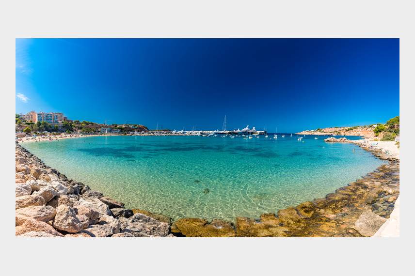 Port Adriano sandy beach Ikos Porto Petro